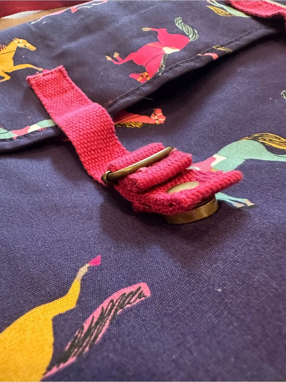 Joules Navy Crossbody Bag with Pink Strap and Multicolor Horse Print